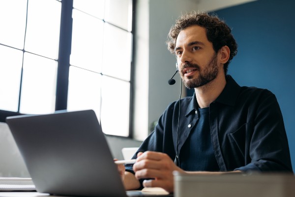 A collections professional working alongside the platform